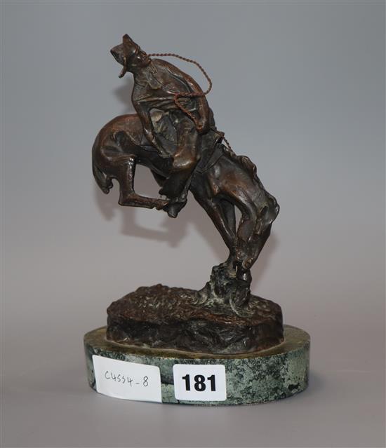 After Frederic Sackrider Remington (American 1861-1909). A bronze, The Outlaw height 21.5cm